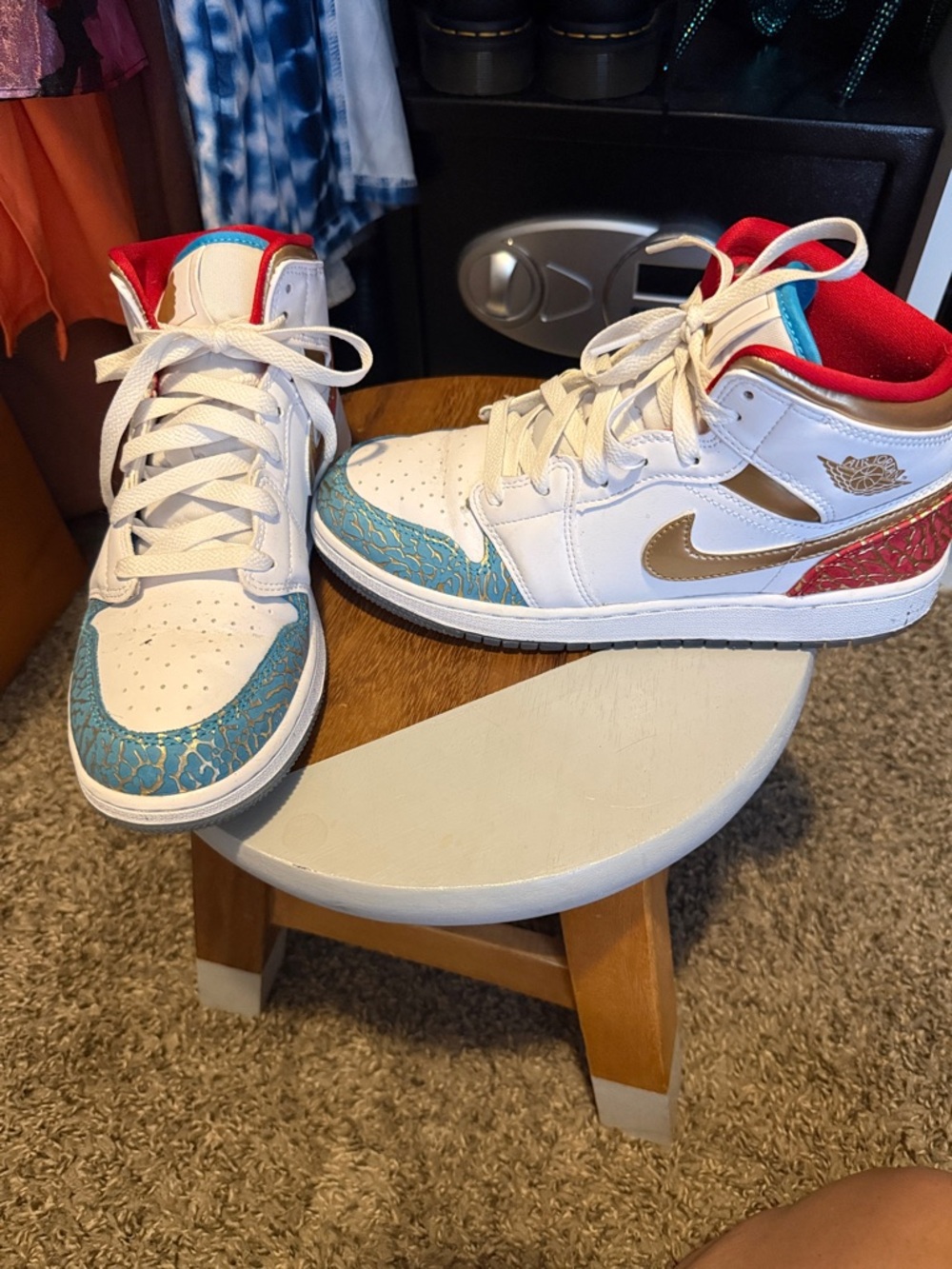 Jordan White Mid-Top Sneakers with Blue and Red Accents
